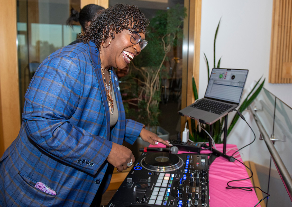 Dr. DeAngela Burns-Wallace takes a spin at the DJ stand