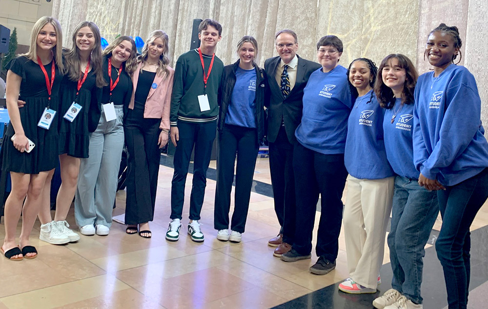 Students pose for a photo at Real World Learning's 'Get on the Bus' event.